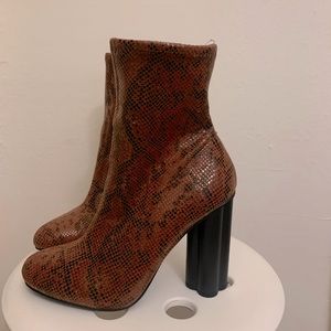 Red snakeskin sock boots